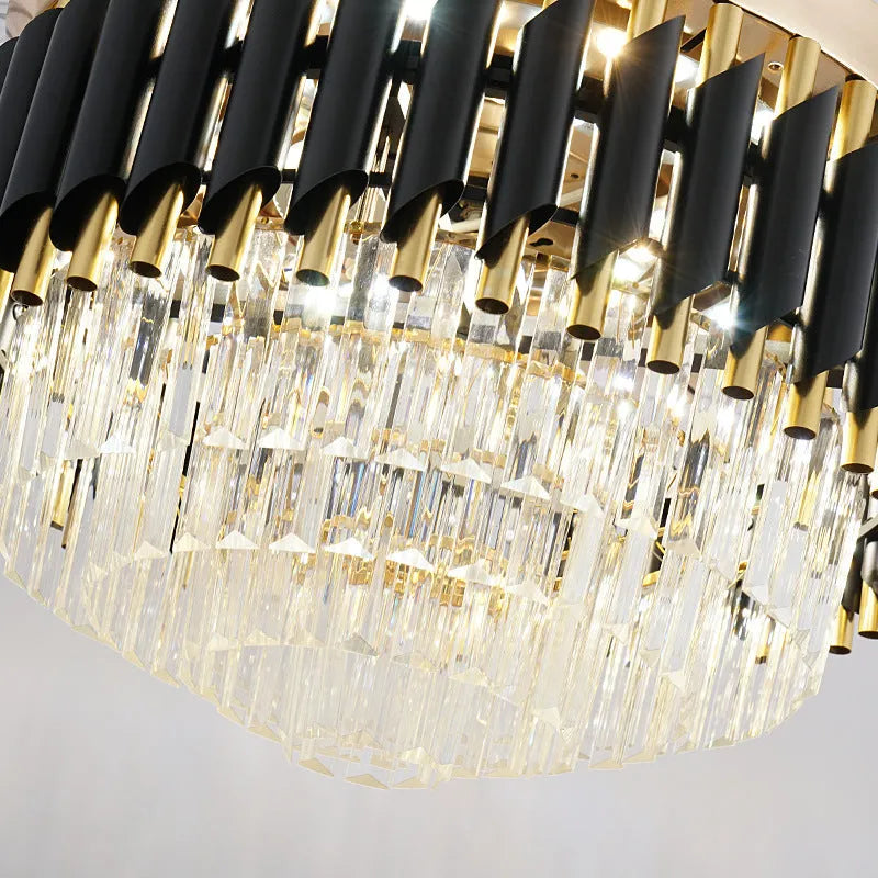 Crystal chandelier style ceiling fan with LED lights and wooden fan blades mounted on a white ceiling.