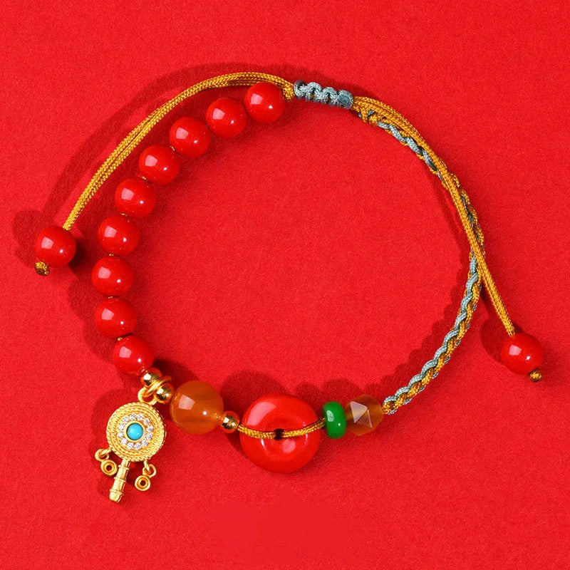 Hand-woven cinnabar peace buckle bracelet in emperor red sand colour with geometric pattern