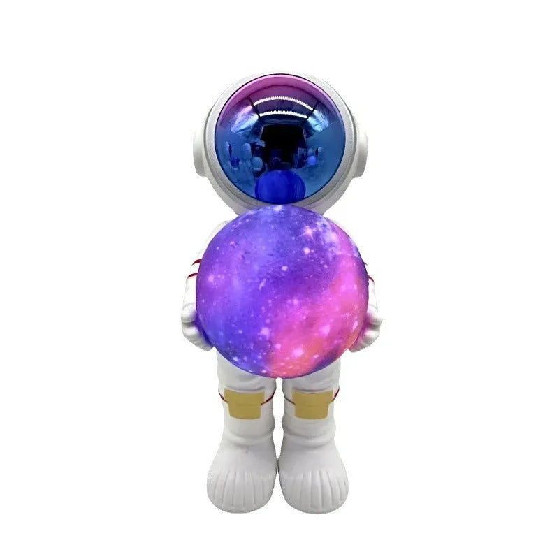 Spaceman Starry Sky Projection Lamp showing star projection effect and Bluetooth speaker