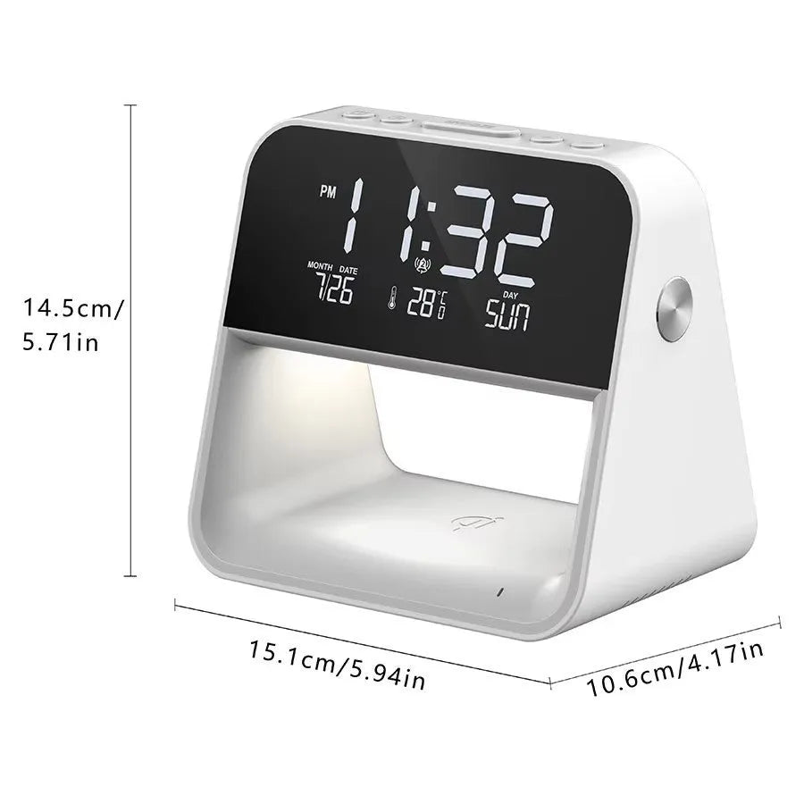 White multifunctional bedside lamp with wireless mobile phone charger and alarm clock on a nightstand