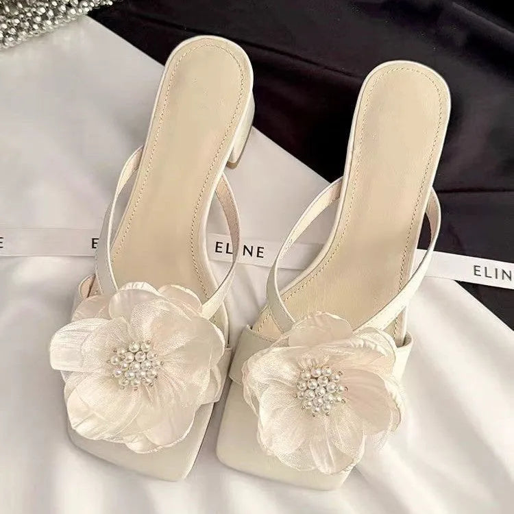 Women's sandals with chunky heel, square toe, flower embellishment on satin strap in cream-white colour