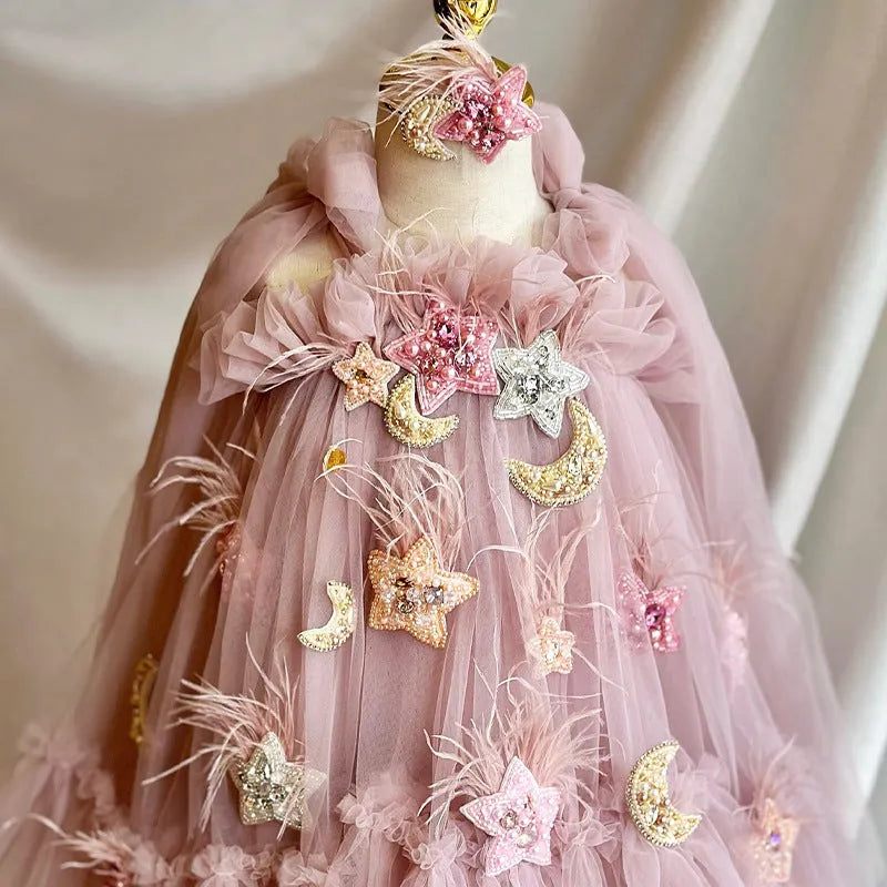 Pink floral children's princess dress with spaghetti straps and bow detail