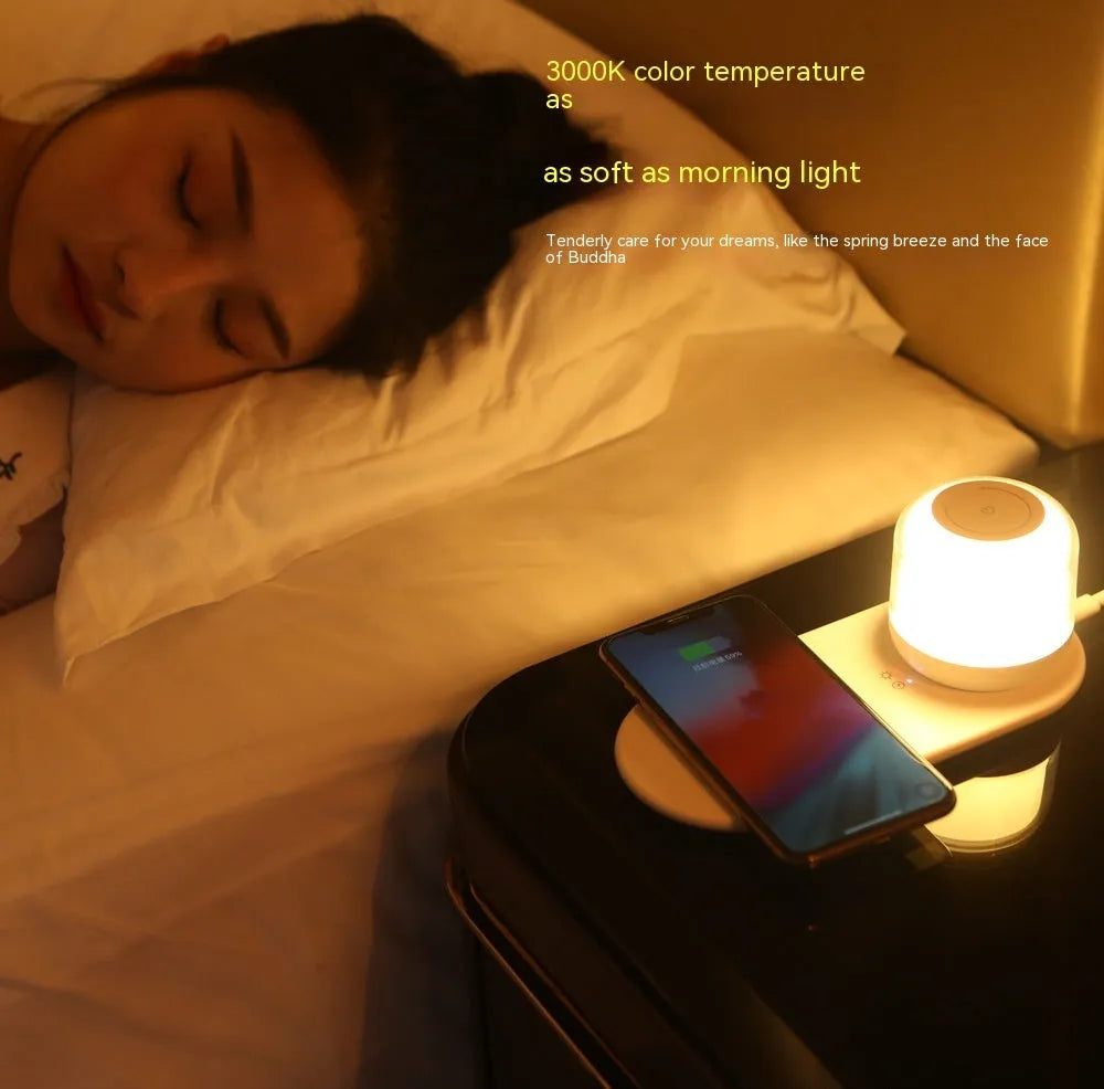 Fast charging wireless charger table lamp two-in-one with white finish, featuring 15W charging pad and warm night light on a wooden desk