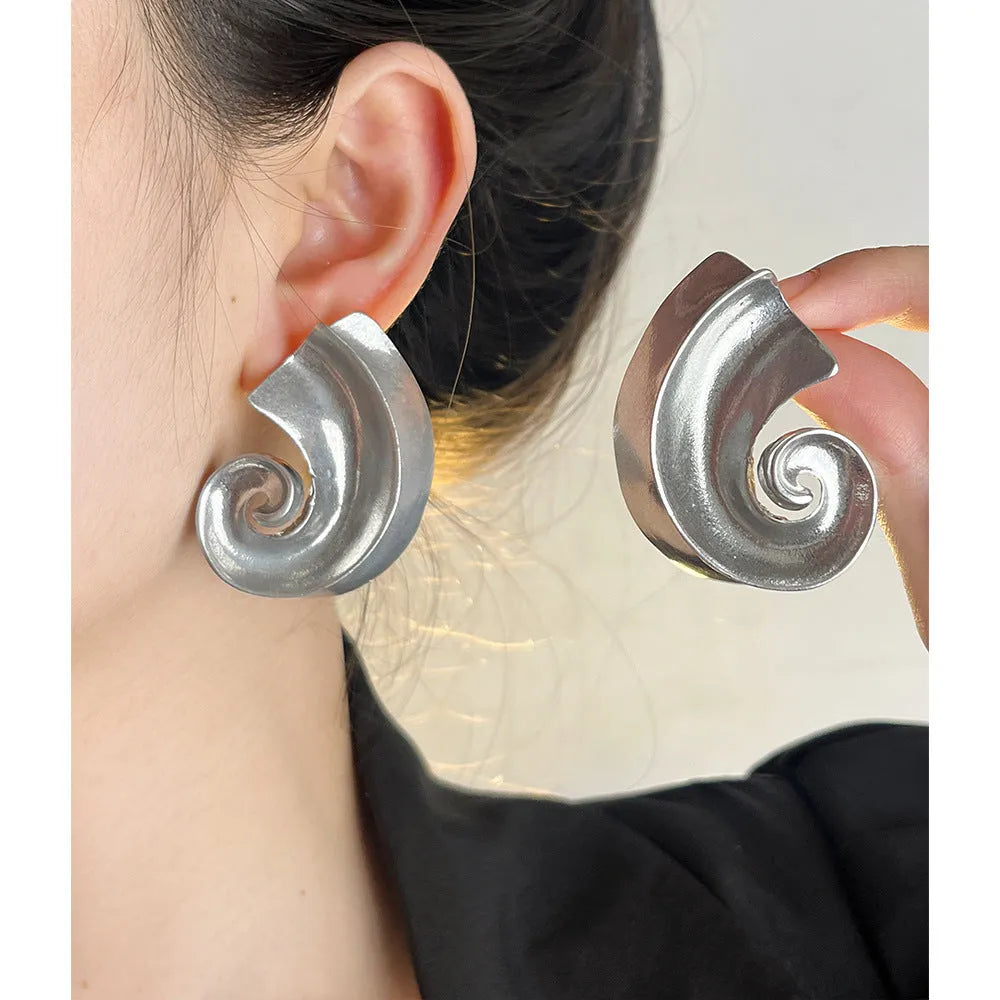 Geometric retro ear studs in alloy with electroplated gold or silver finish measuring 5cm