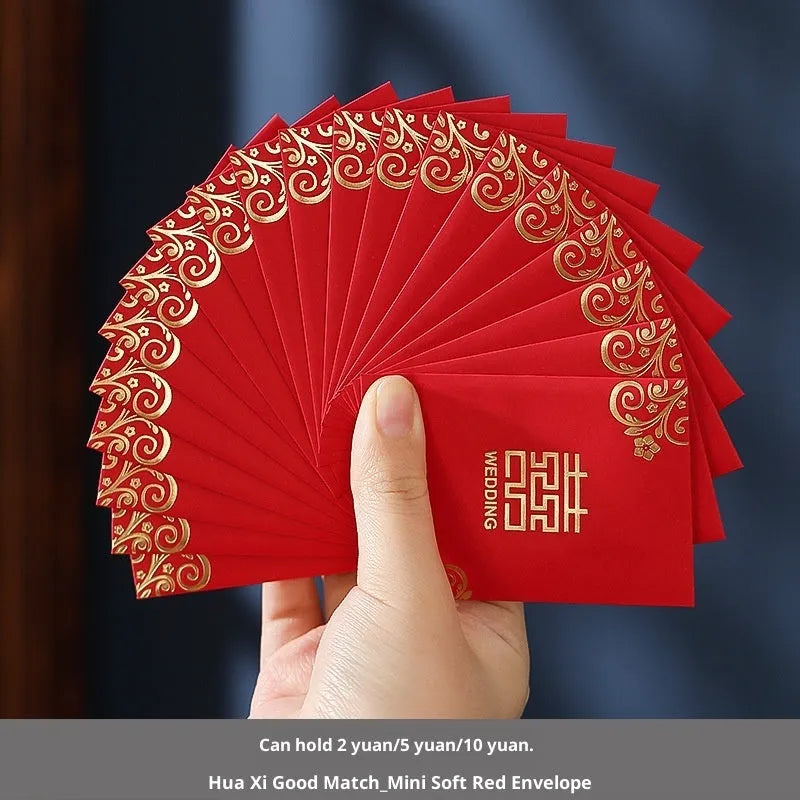 Pack of mini Chinese style wedding red packets in various colours for small cash gifts