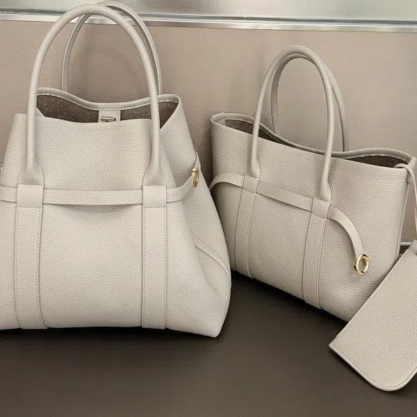 Women's genuine leather single shoulder handbag in horizontal square shape with stitching detail