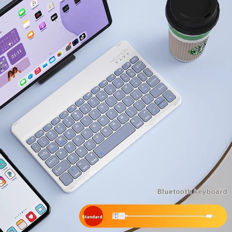 Bluetooth keyboard for tablet in ABS plastic, showing colour options including white, green, and pink.