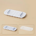 Ice cube tray grid with leverage mechanism and blue storage area, includes ice shovel