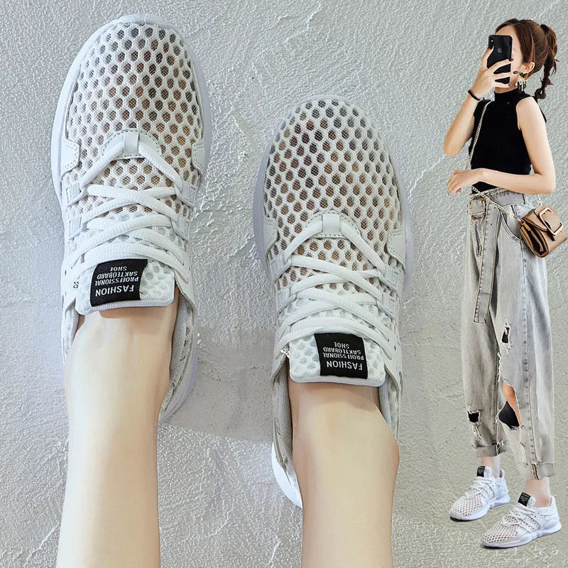 Men's breathable mesh sneakers with hollow-out design and flat EVA sole in black and white colour options