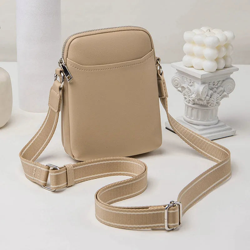 Solid colour mobile phone crossbody bag for women in black, beige, khaki, or green.