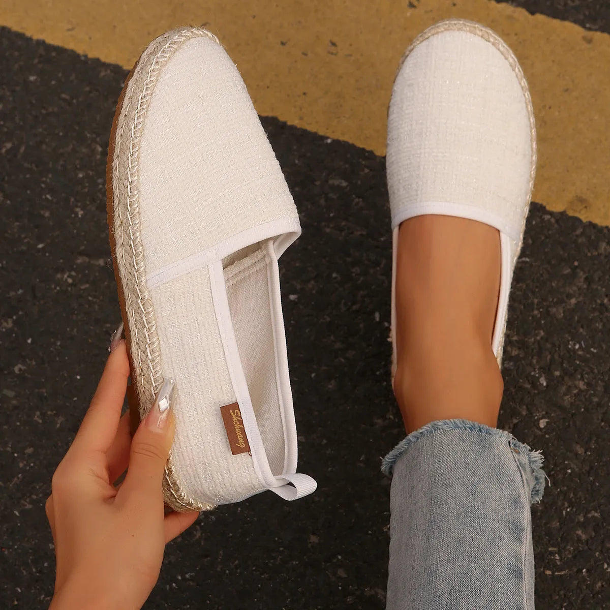Beige rope sole fisherman shoes with canvas uppers and flat heels