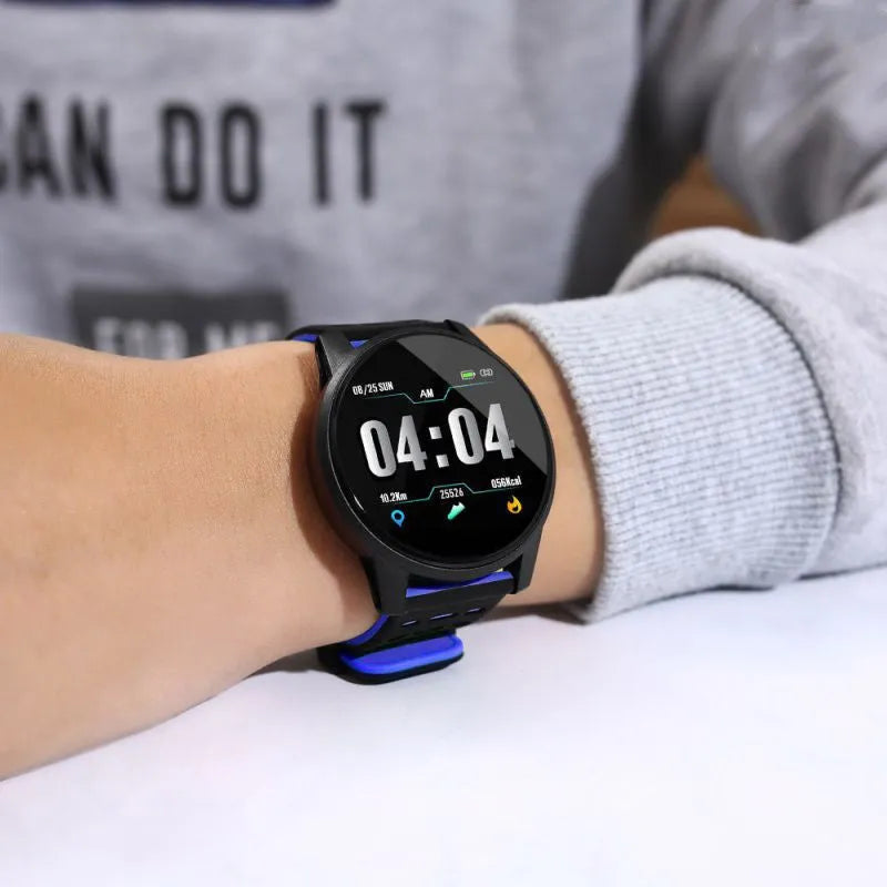 Black smart watch with sport rubber strap and 1.3-inch screen showing step count data.