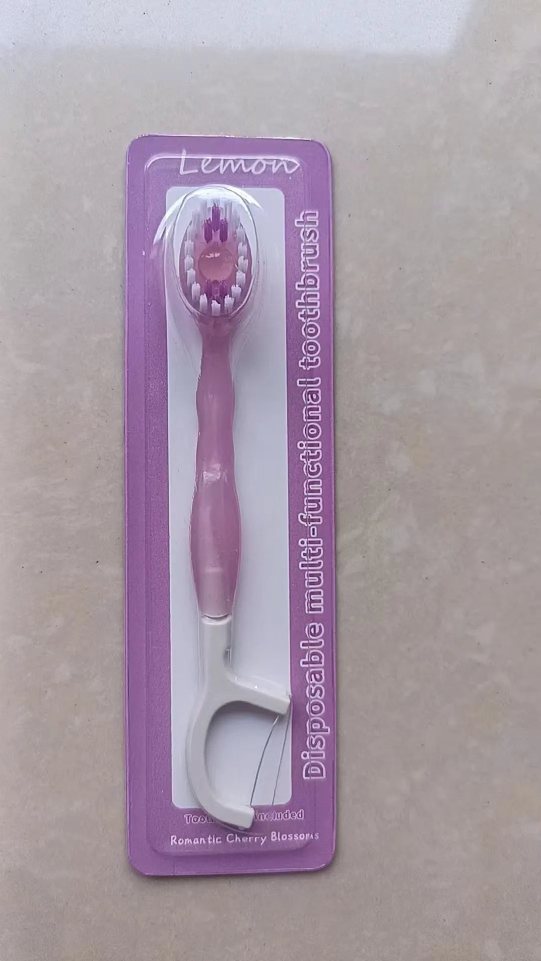 Exploding bead disposable mini toothbrush with toothpaste beads in four flavours for travel