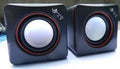 Small black square USB-powered computer speaker for PC 700B desktop systems