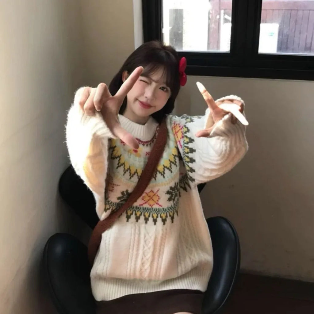 Milky white women's knitwear pullover with loose lantern sleeves and a Mori-style texture.