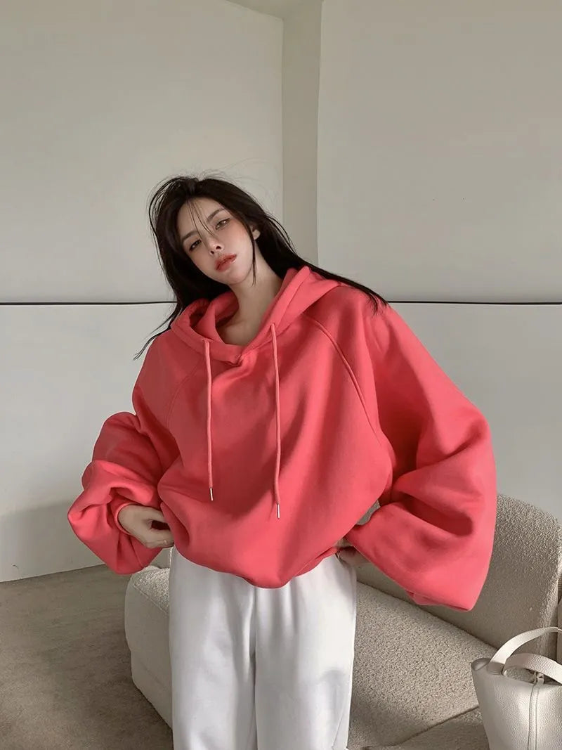 Women's loose mulberry silk hooded sweater in solid watermelon red, sleeveless A-line cut