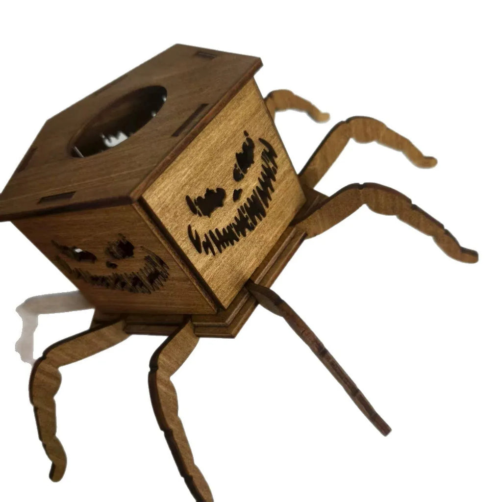 Wooden spider-shaped mini lantern candlestick Halloween decoration on a table