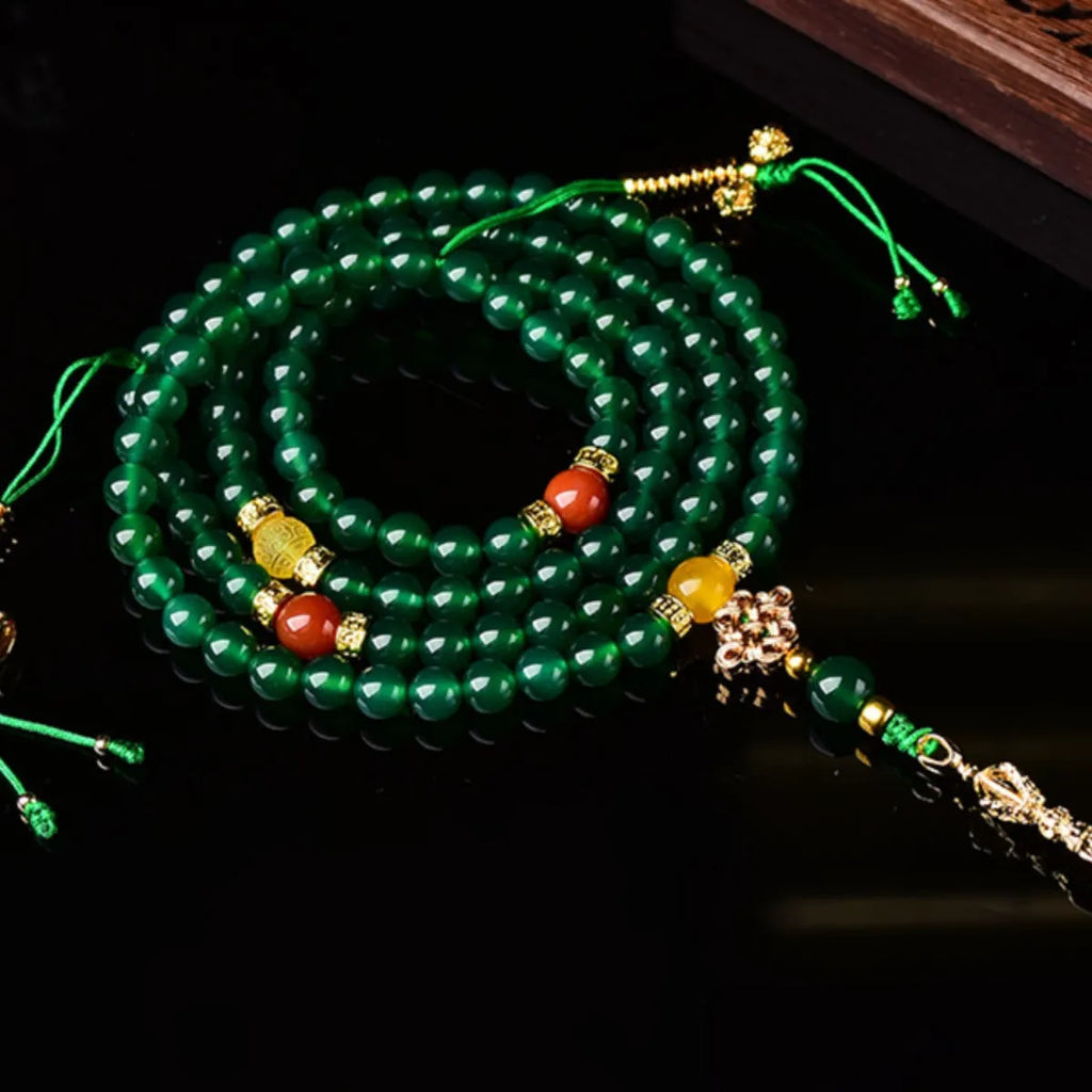 Handmade multi-strand bracelet made with round green agate beads from Brazil