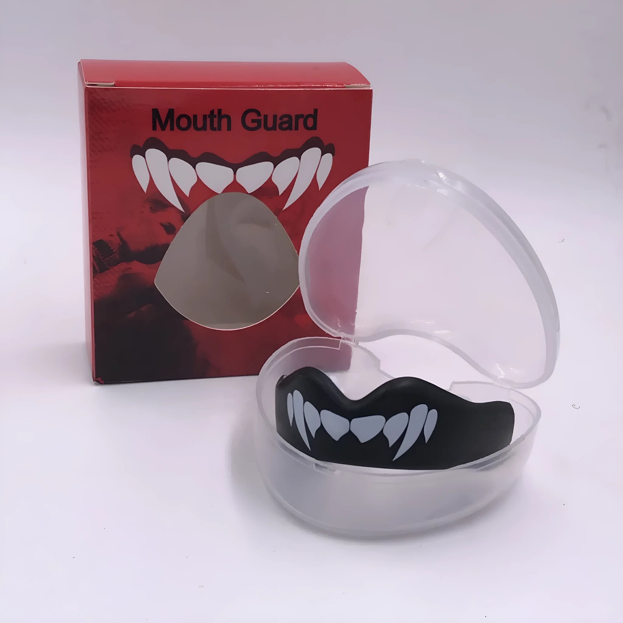 Adult boxing mouthguard with tooth socket design in black and white printed teeth graphic