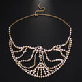Geometric alloy party mask with electroplated gemstones in silver and gold colours