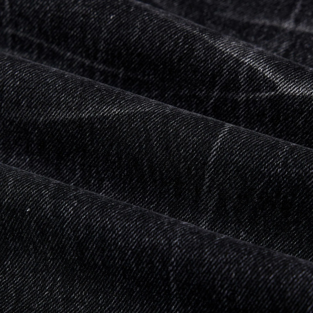 Men's black straight-leg jeans with lightning crack pattern on American washed denim