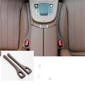 Two polyresin car seat gap sealing strips in chosen colour, showing integrated handle.