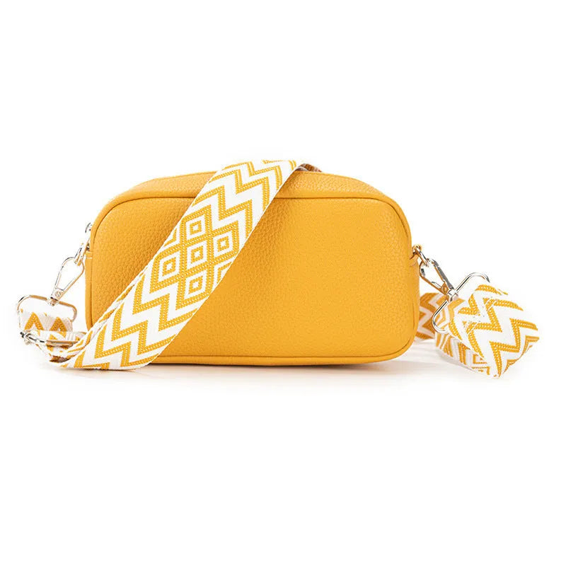 Soft black PU crossbody bag for women with a single shoulder strap and decorative sewing thread details.