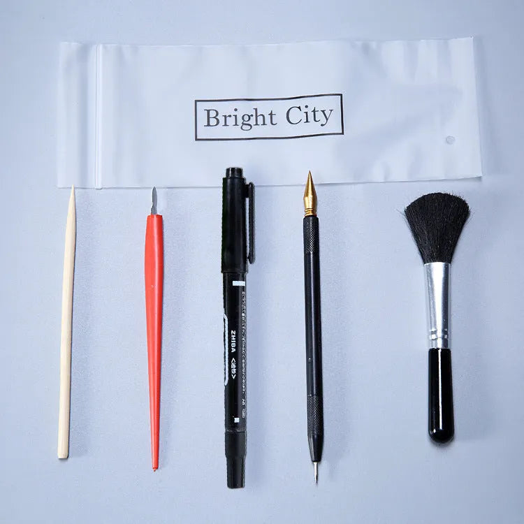 Scratch painting tools kit showing healing pen models, scrapers, brushes, and photo frames for creative art projects