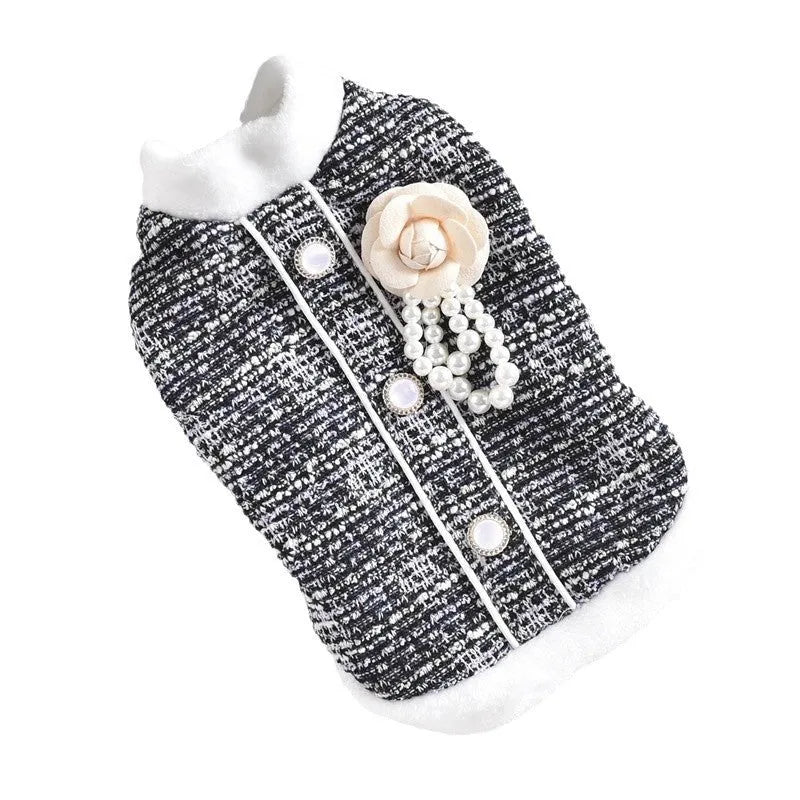 Black or purple sausage-themed cat jacket with Velcro fastening on a small feline