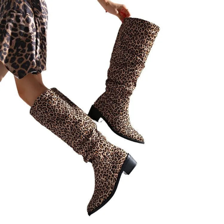 Brown leopard print women's winter boots with a chunky square toe and mid-height heel on a white background.