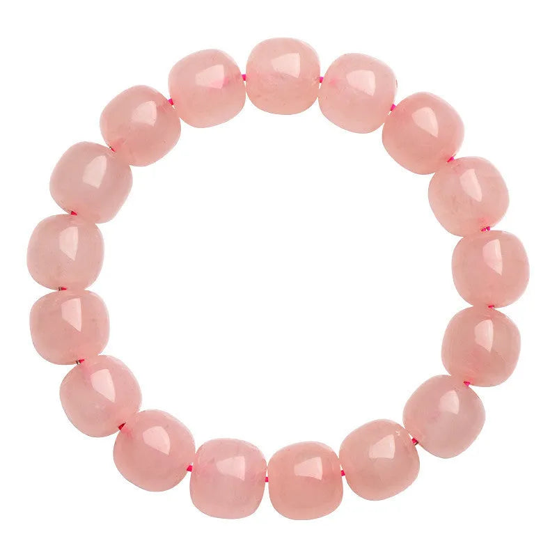 Natural pink crystal barrel bead bracelet with geometric design and polished finish