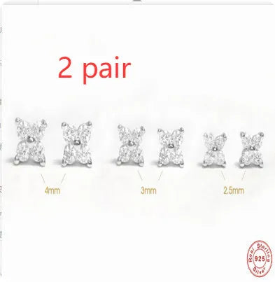 S925 sterling silver stud earrings with a geometric crystal flower design in gold or platinum plating.