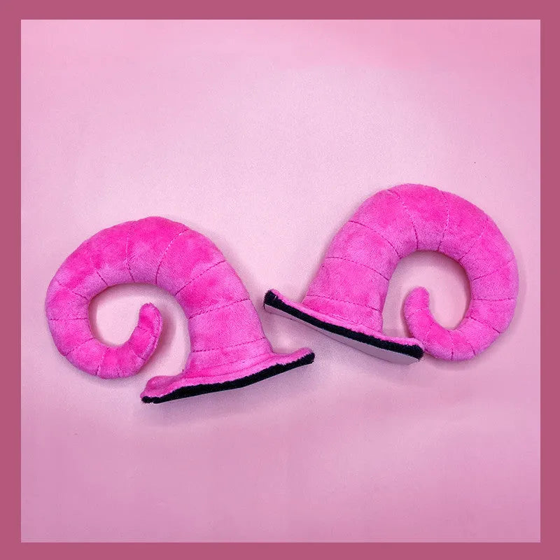 A pair of composite fibre demon horn ornaments for a motorcycle helmet in a chosen colour.