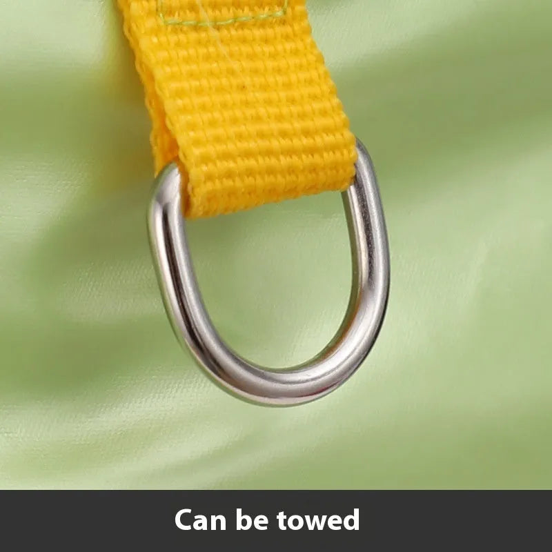 Green waterproof cotton dog coat on canine showing four-legged design and casual styling
