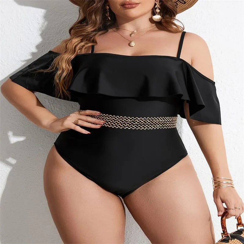 Women's solid black one-piece polyester swimsuit on a hanger