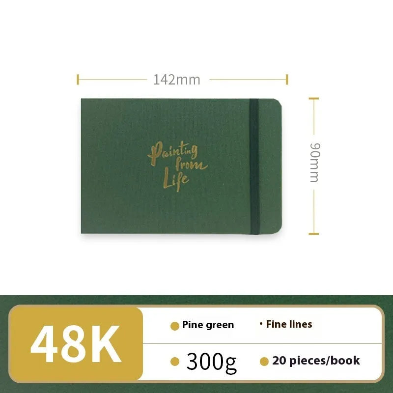 Feiluniao handmade fabric watercolour notebook with illustrated cover, open to show blank paper pages.