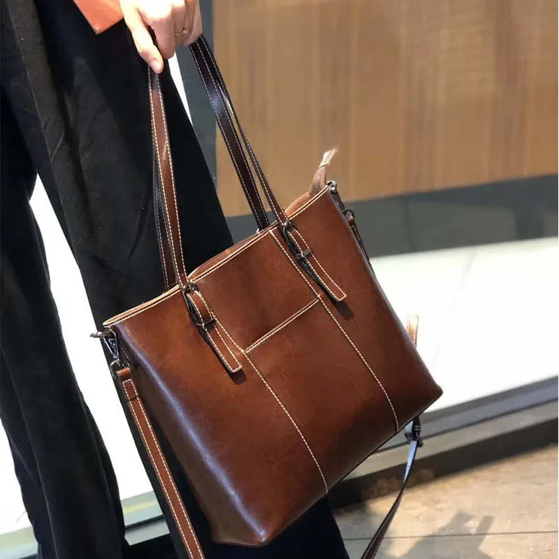 Genuine leather women's retro shoulder bag in brown with multiple compartments and detachable straps