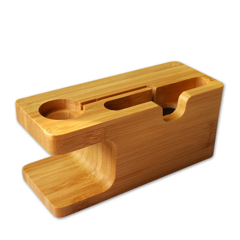 Bamboo carved phone stand with round carving design on office desk, 149mm tall smartphone holder