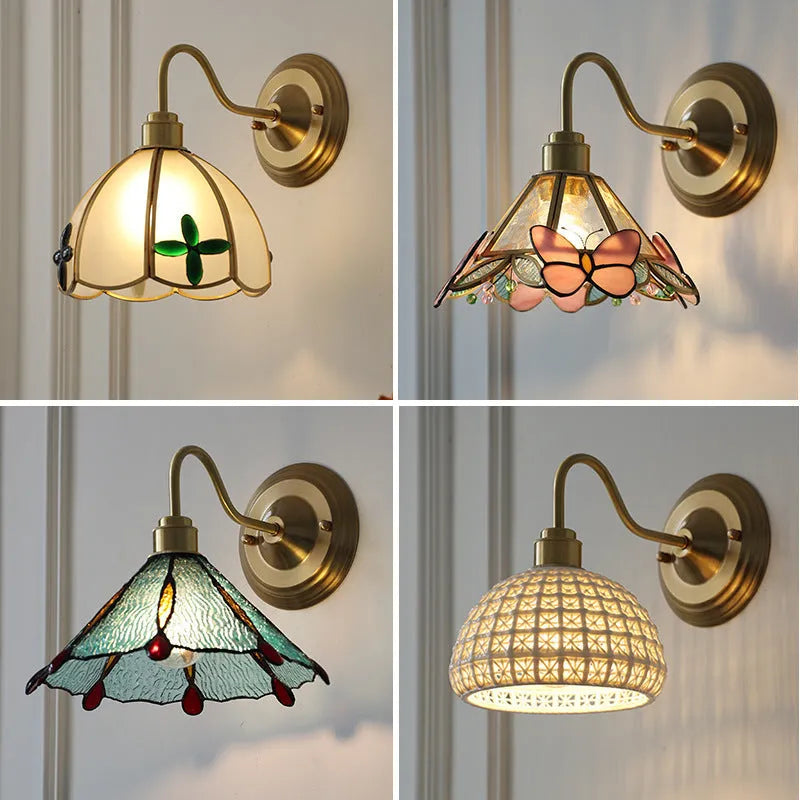 Retro brass wall lamp with stone-patterned transparent glass shade and copper body