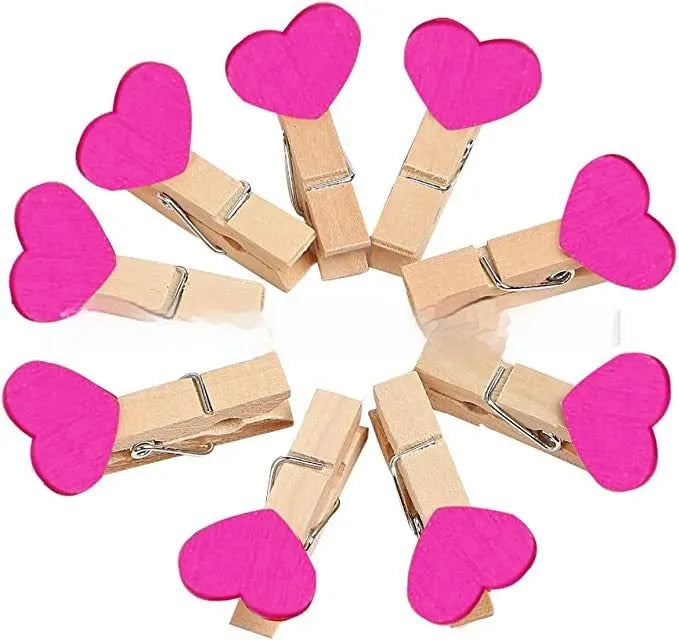 Set of five heart-shaped wooden hair clips in red, pink, white, and yellow colours.
