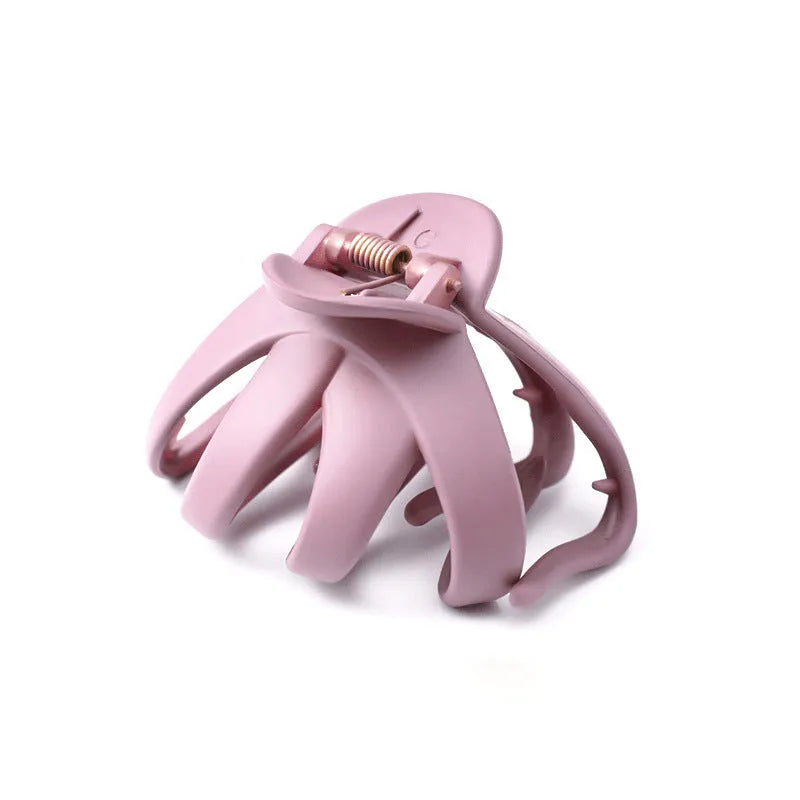 Children's plastic hair clip in small size available in green, dark blue, wine red, black, dark pink, and blue gray.