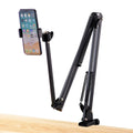 Foldable metal desktop lazy bracket with tablet clip and 360° rotation arm on a desk