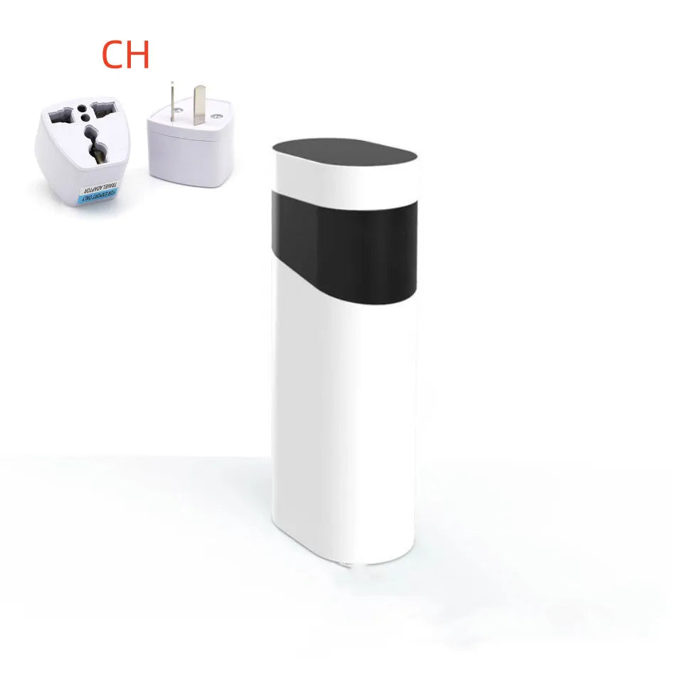 Black portable instant water dispenser with digital display on a wooden desktop.