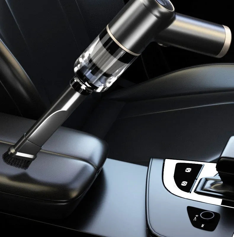 Black wireless handheld vacuum cleaner with multiple nozzles for car and home cleaning.