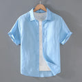 Men's casual short-sleeved linen shirt in cardigan style showing colour options including apricot, dark red and sky blue