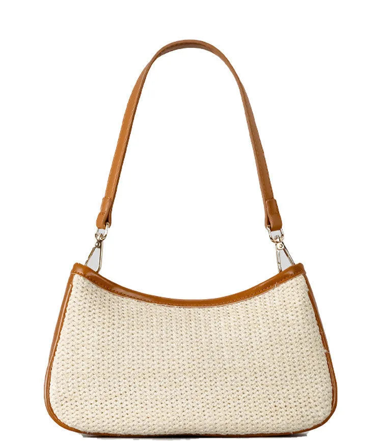 Khaki hand-woven straw crossbody bag with single shoulder strap showing textured PP grass construction