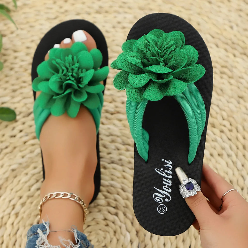 Solid-colour flip-flops with floral design on lightweight EVA sole in beige, red, black, and green options