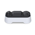 Gray PS5 dual-seat gamepad charger with display light and TYPE-C interface on a desk