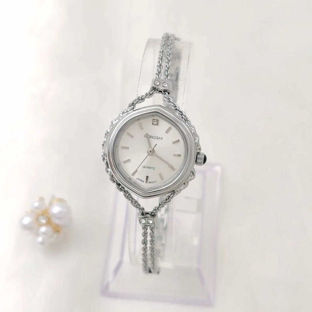 Gold and silver mori style ladies quartz watch with 25mm dial and chain strap