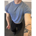 Men's slim fit polyester t-shirt with thread-cuffed short sleeves in flower blue colour